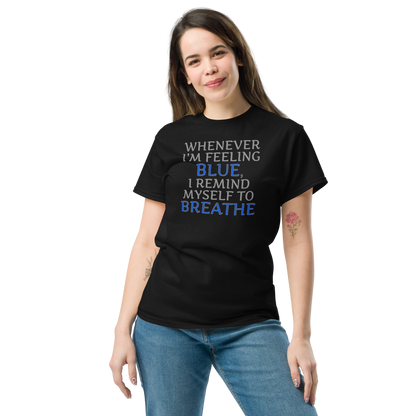 "Whenever I'm feeling blue, I remind myself to breathe" printed on a black unisex classic tee worn by a female