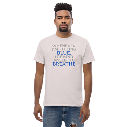 "Whenever I'm feeling blue, I remind myself to breathe" printed on a ice grey unisex classic tee worn by a male