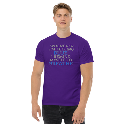 "Whenever I'm feeling blue, I remind myself to breathe" printed on a purple unisex classic tee worn by a male