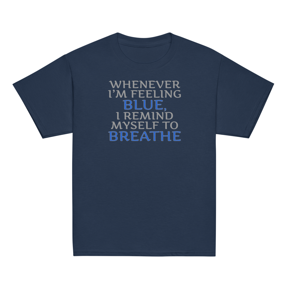 "Whenever I'm feeling blue, I remind myself to breathe" printed on a navy youth classic tee laying on a flat surface