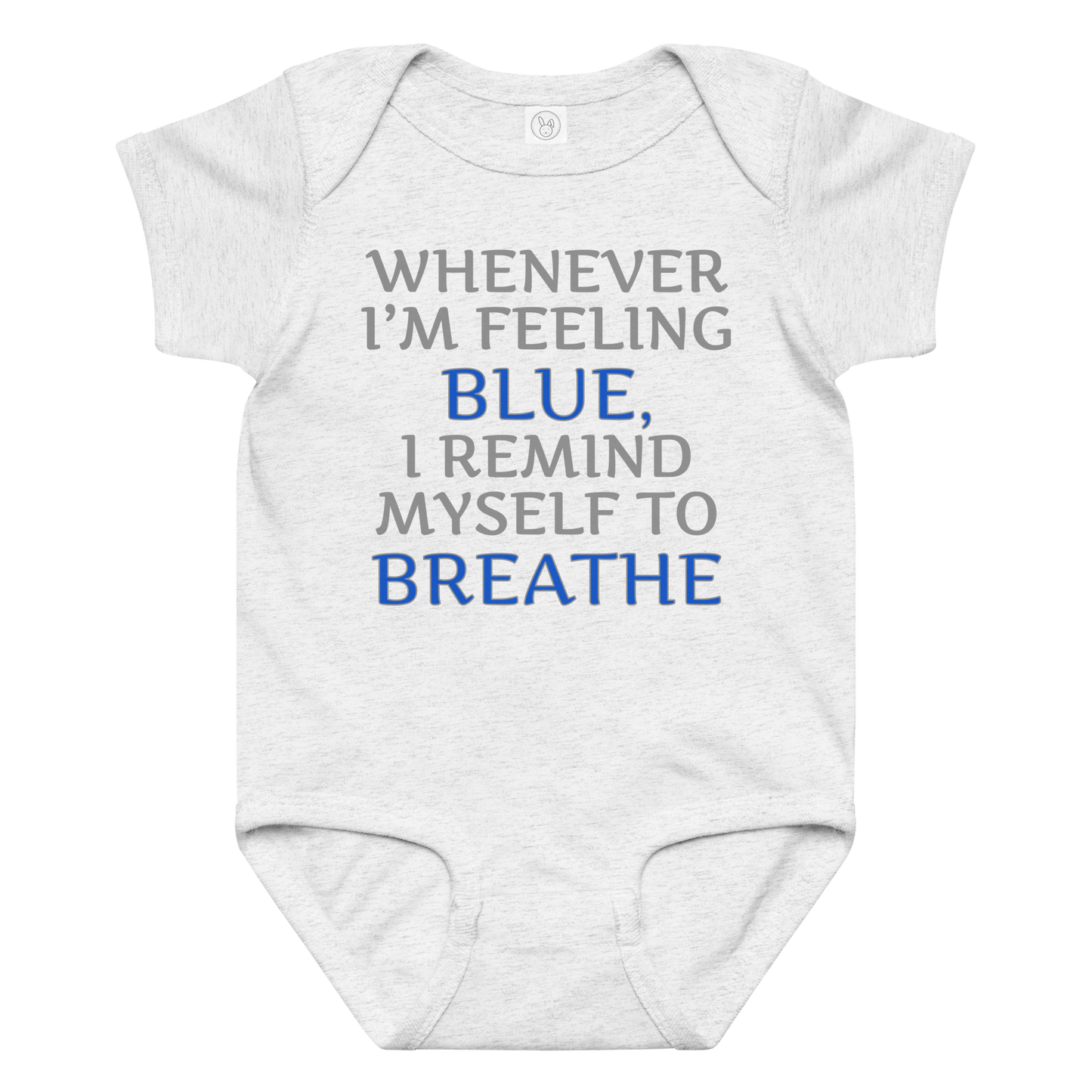 "Whenever I'm feeling blue, I remind myself to breathe" printed on a ash baby jersey bodysuit laying on a flat surface amongst other clothes