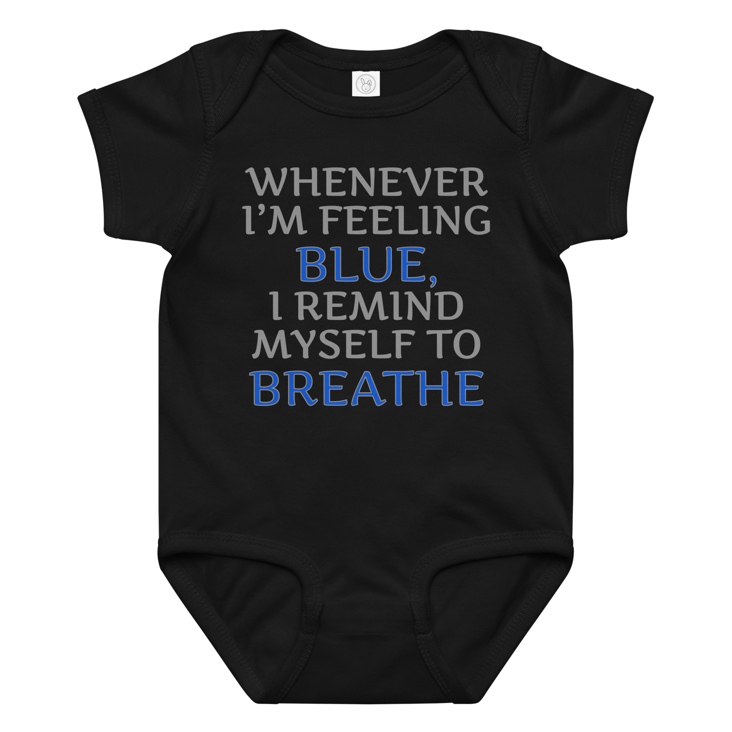 "Whenever I'm feeling blue, I remind myself to breathe" printed on a black baby jersey bodysuit laying on a flat surface amongst other clothes