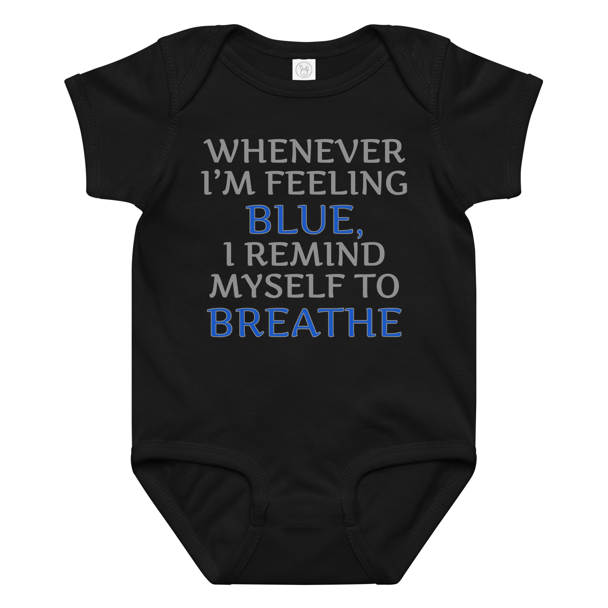 "Whenever I'm feeling blue, I remind myself to breathe" printed on a black baby jersey bodysuit laying on a flat surface amongst other clothes