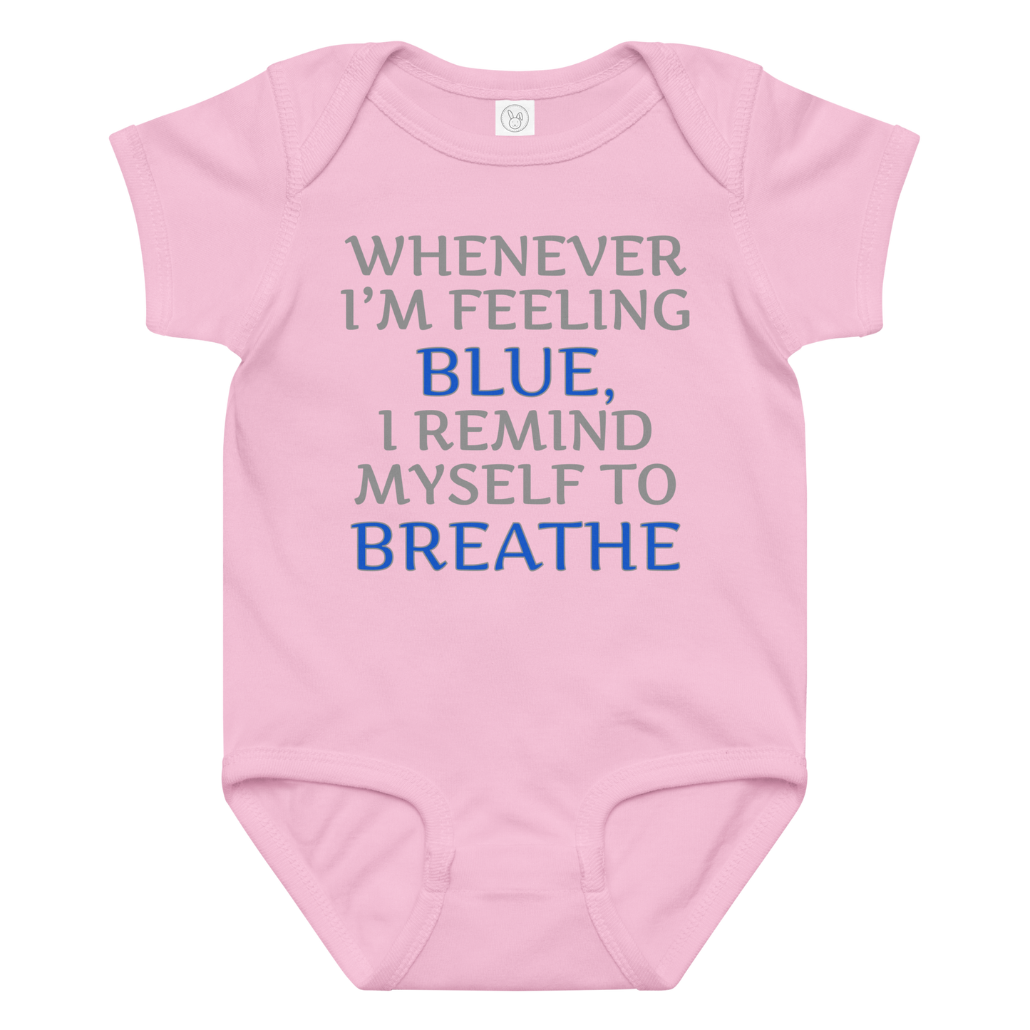 "Whenever I'm feeling blue, I remind myself to breathe" printed on a pink baby jersey bodysuit laying on a flat surface amongst other clothes