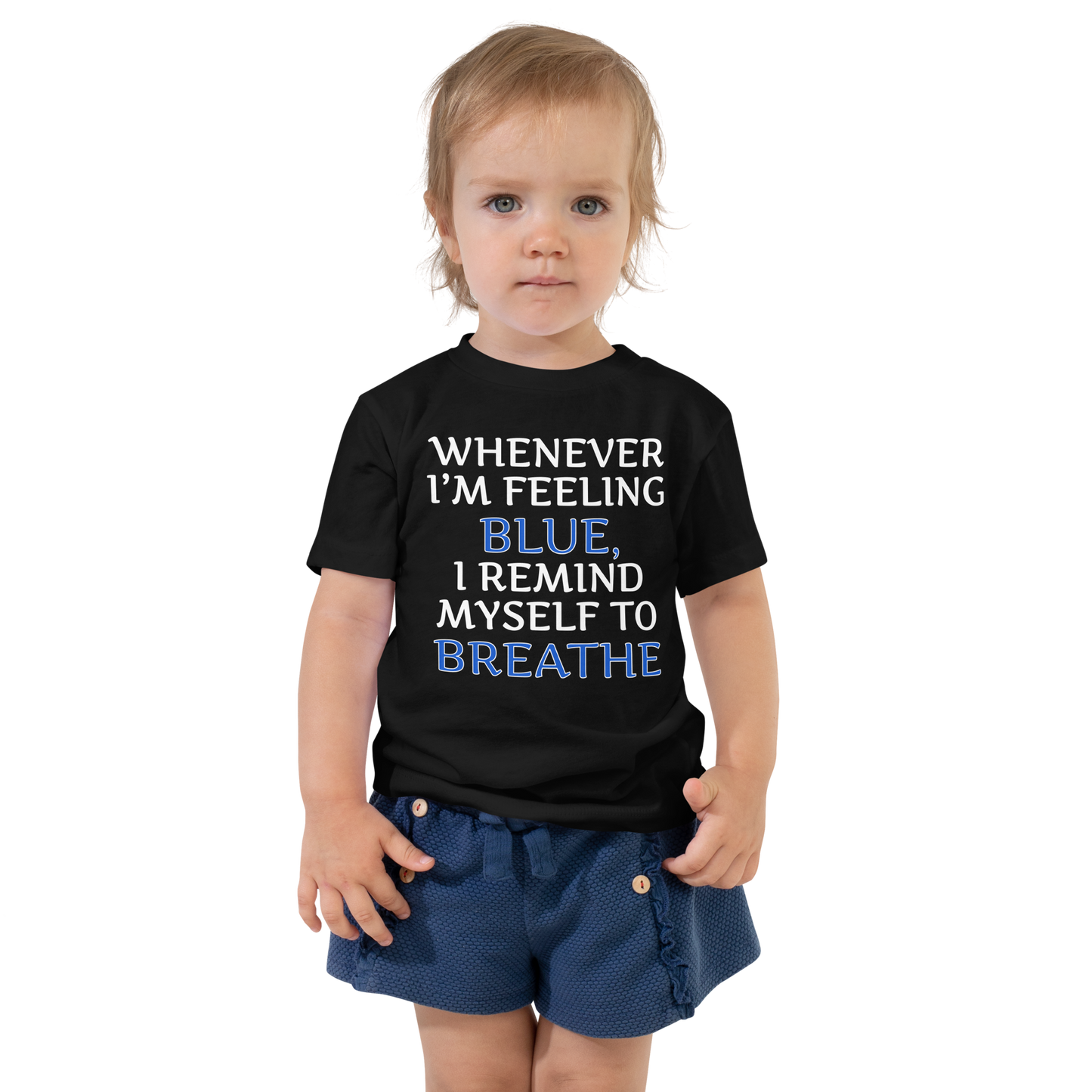 "Whenever I'm feeling blue, I remind myself to breathe" printed on a black toddler short sleeve tee worn by a female