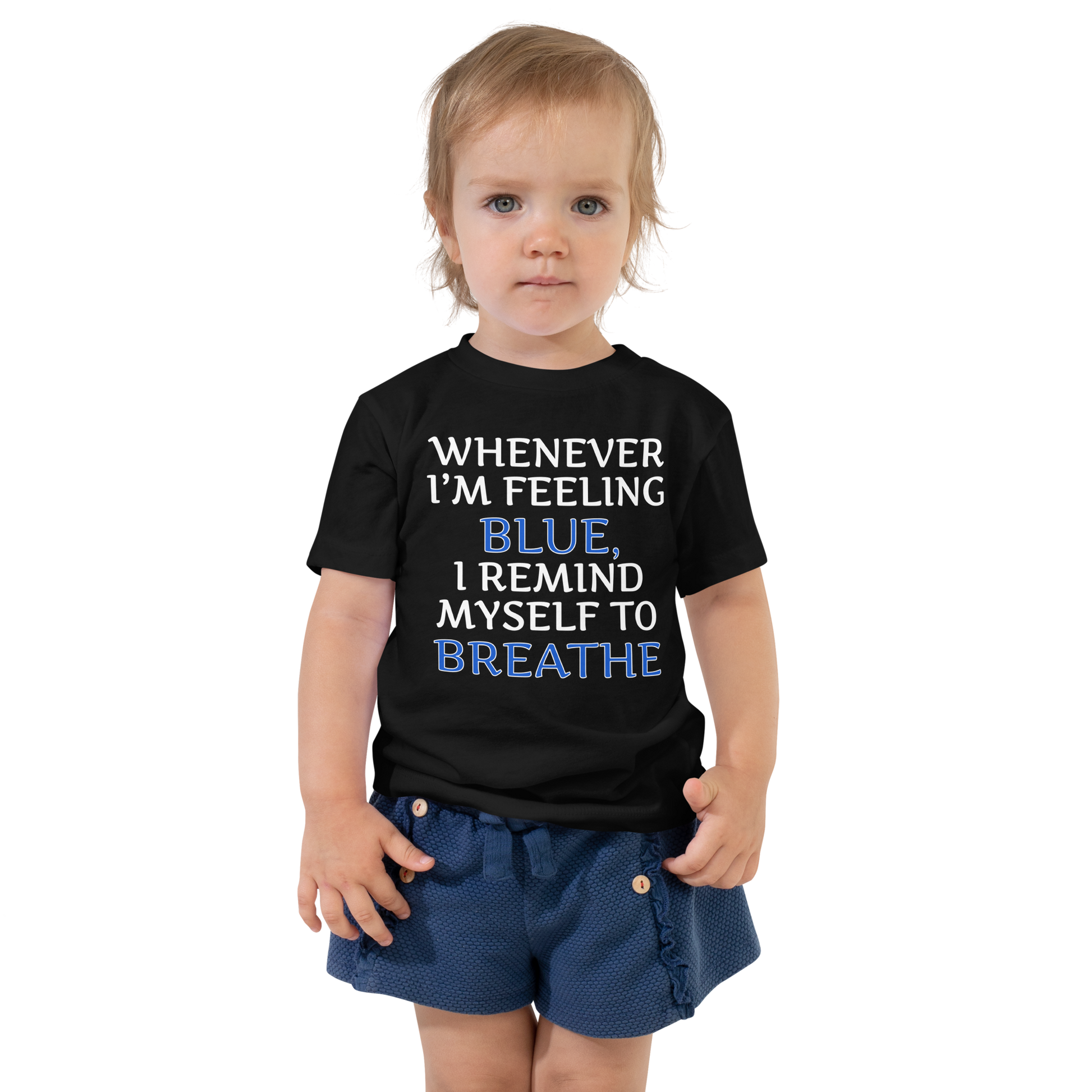 "Whenever I'm feeling blue, I remind myself to breathe" printed on a black toddler short sleeve tee worn by a female