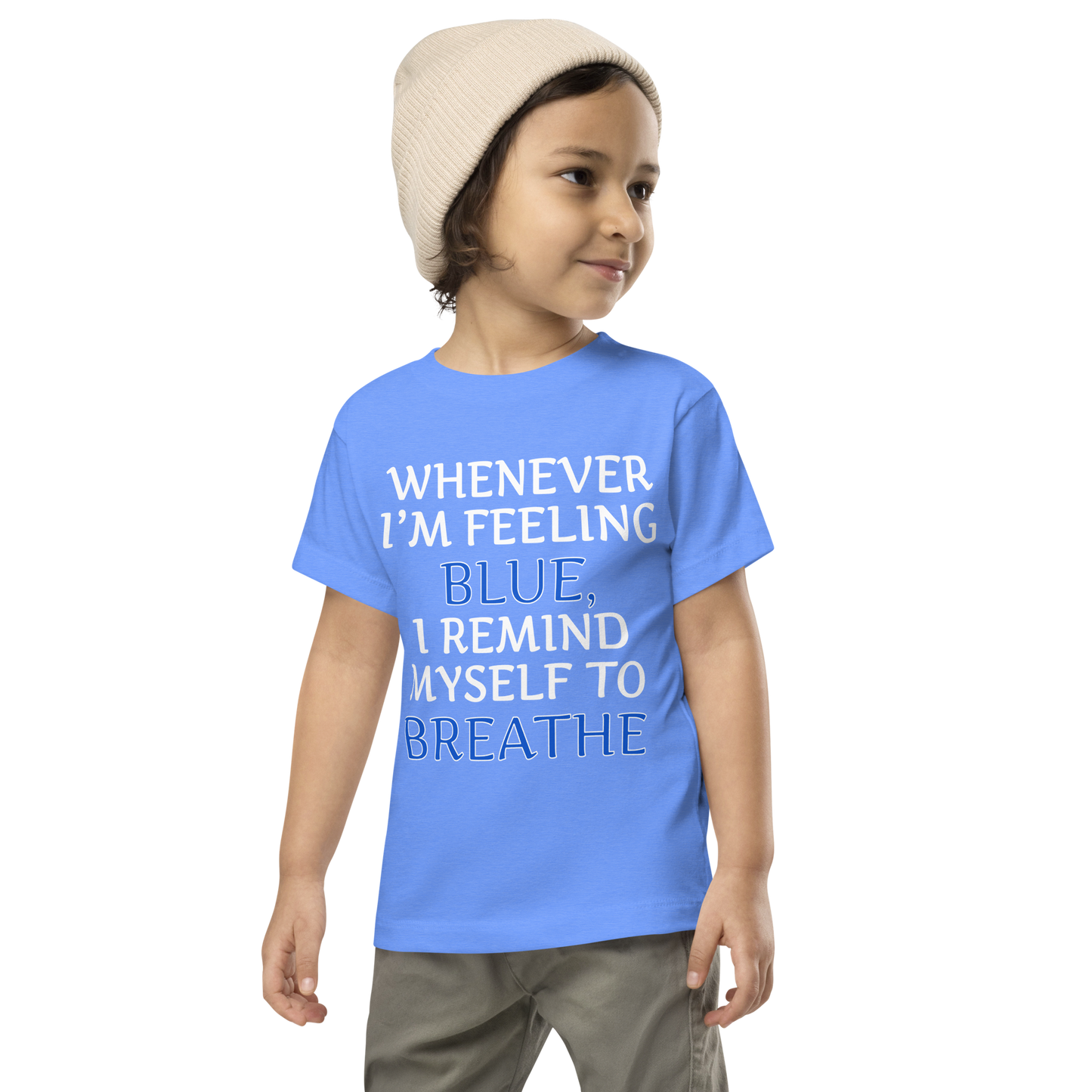 "Whenever I'm feeling blue, I remind myself to breathe" printed on a heather columbia blue toddler short sleeve tee worn by a male wearing a cap
