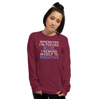 "Whenever I'm feeling blue, I remind myself to breathe" printed on a maroon men's long sleeve shirt worn by a female