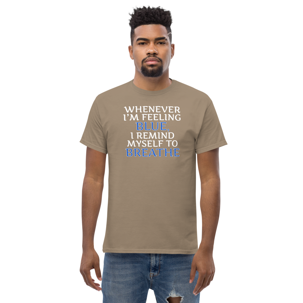 "Whenever I'm feeling blue, I remind myself to breathe" printed on a brown savana unisex classic tee worn by a male