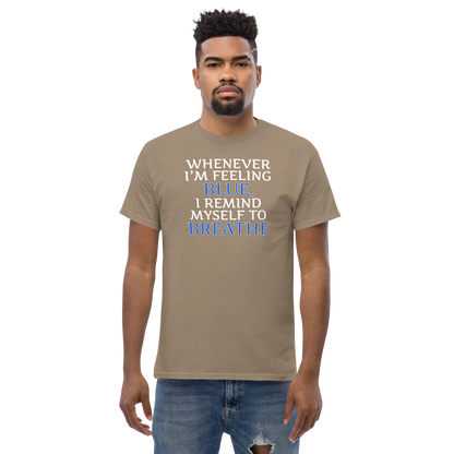 "Whenever I'm feeling blue, I remind myself to breathe" printed on a brown savana unisex classic tee worn by a male