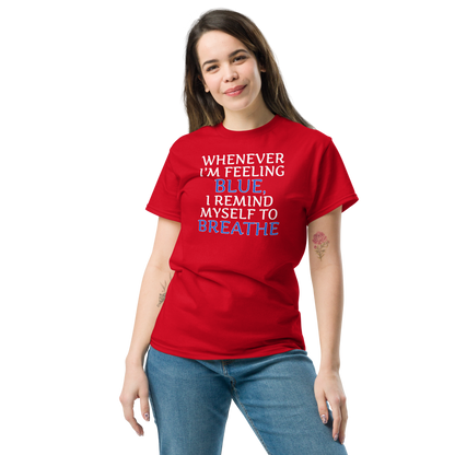 "Whenever I'm feeling blue, I remind myself to breathe" printed on a red unisex classic tee worn by a female