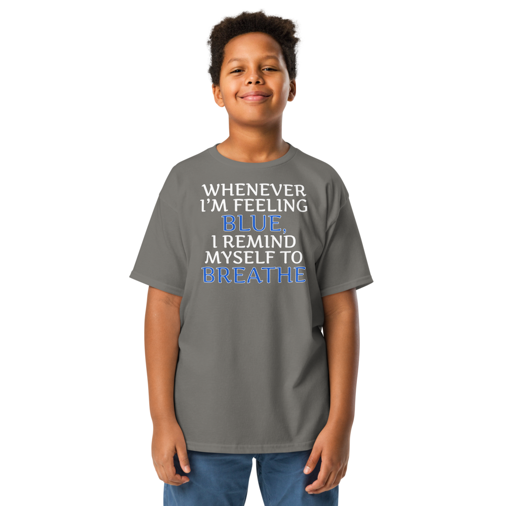 "Whenever I'm feeling blue, I remind myself to breathe" printed on a charcoal youth classic tee worn by a male