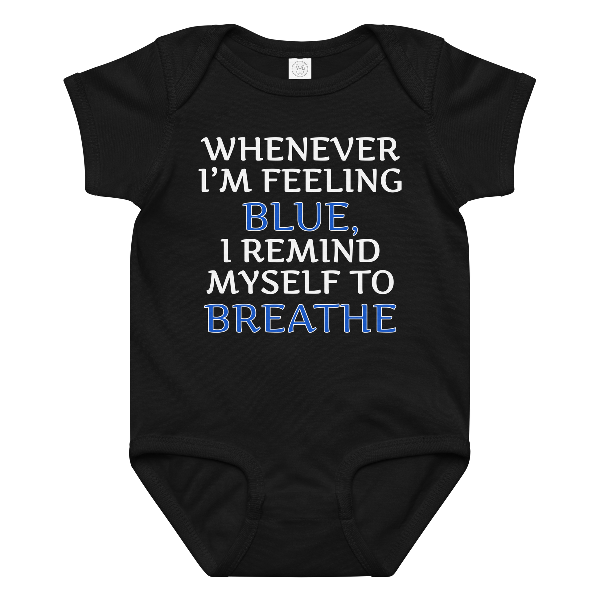 "Whenever I'm feeling blue, I remind myself to breathe" printed on a black baby jersey bodysuit laying on a flat surface amongst other clothes