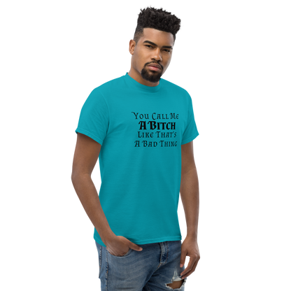 "You Call Me A Bitch Like That's A Bad Thing" printed on a tropical blue unisex classic tee worn by a male