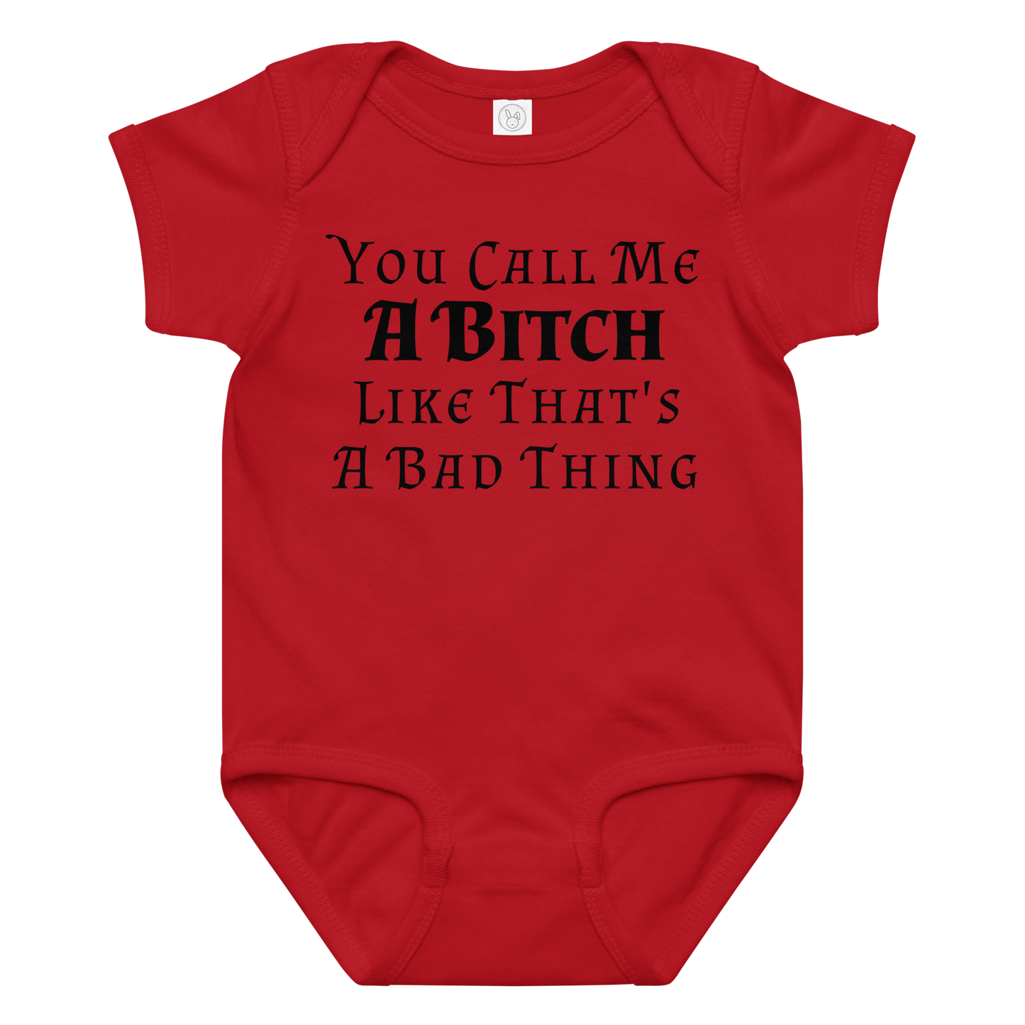 "You Call Me A Bitch Like That's A Bad Thing" printed on a red baby jersey bodysuit laying on a flat surface amongst other clothes