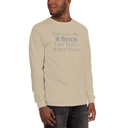 "You Call Me A Bitch Like That's A Bad Thing" printed on a sand men's long sleeve shirt worn by a male