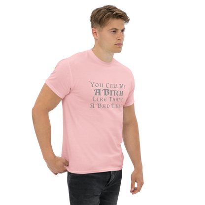 "You Call Me A Bitch Like That's A Bad Thing" printed on a light pink unisex classic tee worn by a male