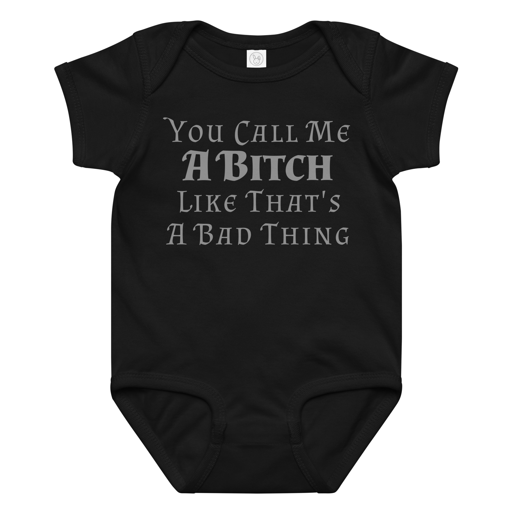 "You Call Me A Bitch Like That's A Bad Thing" printed on a black baby jersey bodysuit laying on a flat surface amongst other clothes