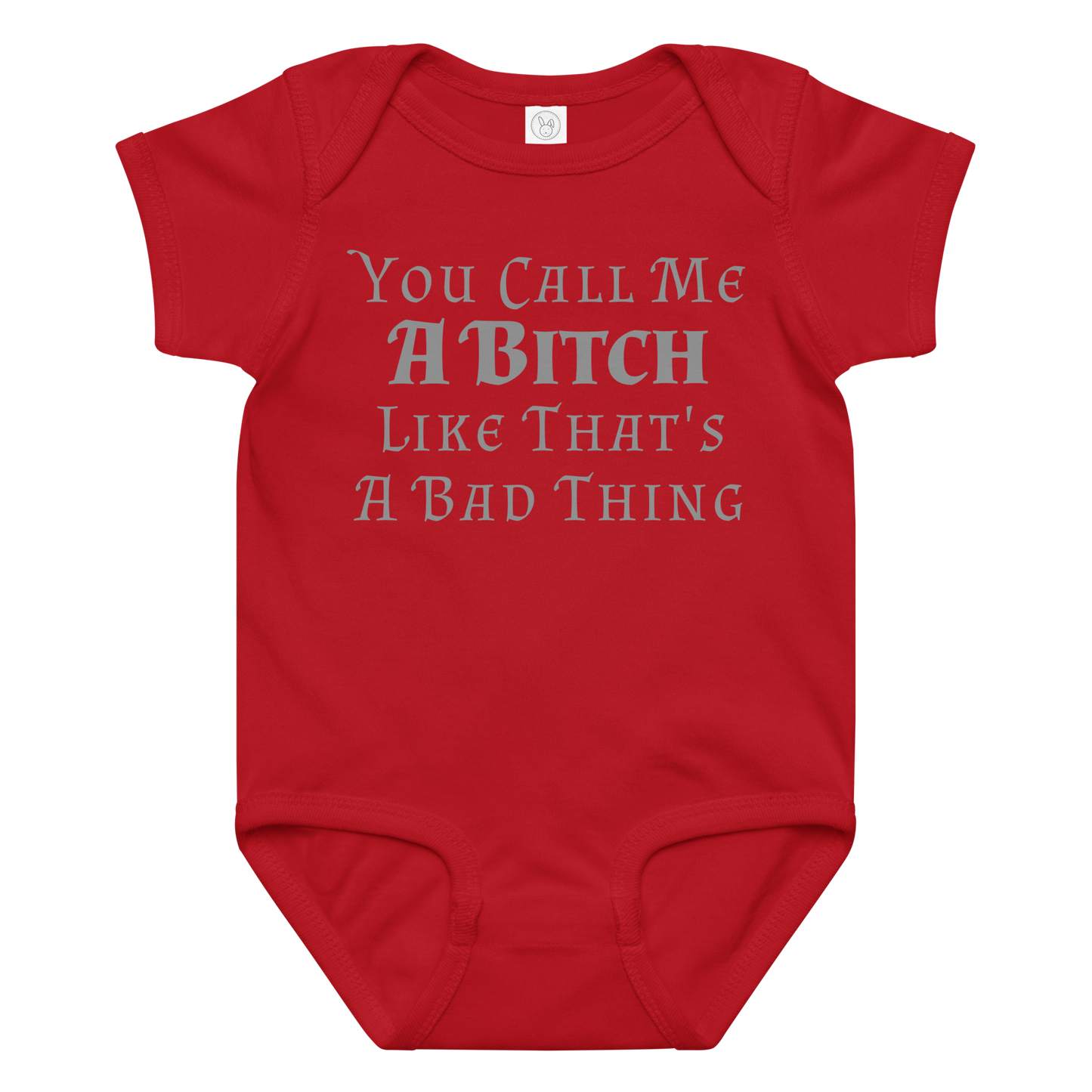 "You Call Me A Bitch Like That's A Bad Thing" printed on a red baby jersey bodysuit laying on a flat surface amongst other clothes