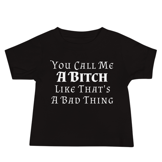 "You Call Me A Bitch Like That's A Bad Thing" printed on a black baby jersey short sleeve tee laying on a flat surface