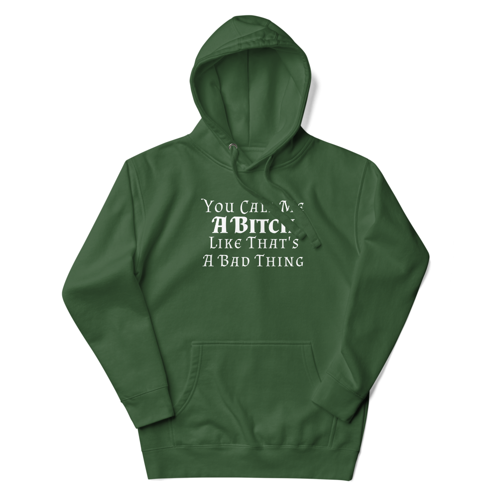 "You Call Me A Bitch Like That's A Bad Thing" printed on a forest green unisex hoodie laying on a flat surface with the hood up