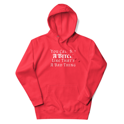 "You Call Me A Bitch Like That's A Bad Thing" printed on a team red unisex hoodie laying on a flat surface with the hood up