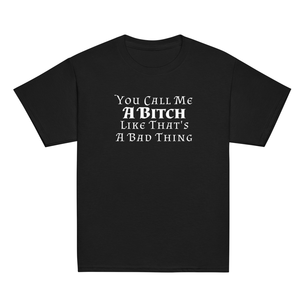 "You Call Me A Bitch Like That's A Bad Thing" printed on a black youth classic tee laying on a flat surface