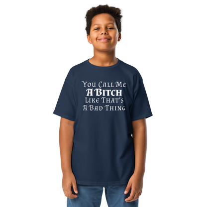 "You Call Me A Bitch Like That's A Bad Thing" printed on a navy youth classic tee worn by a male