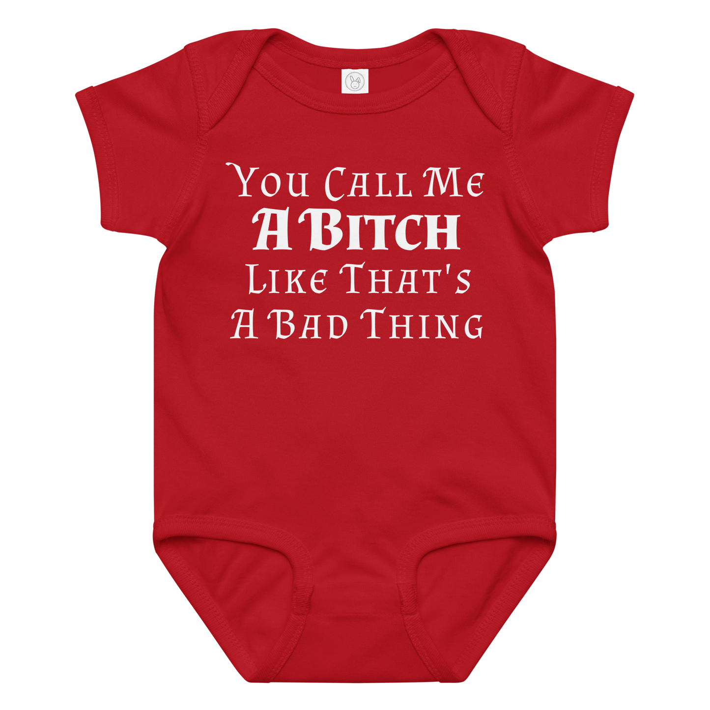 "You Call Me A Bitch Like That's A Bad Thing" printed on a red baby jersey bodysuit laying on a flat surface amongst other clothes