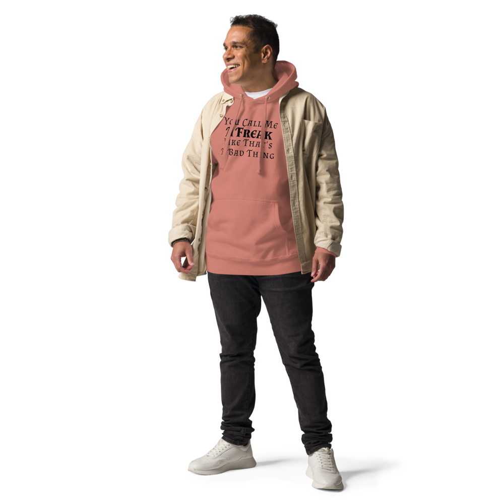 "You Call Me A Freak Like That's A Bad Thing" printed on a dusty rose unisex hoodie worn by a male with a jacket on top
