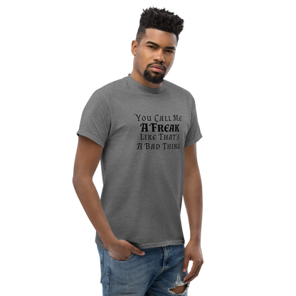 "You Call Me A Freak Like That's A Bad Thing" printed on a graphite heather unisex classic tee worn by a male