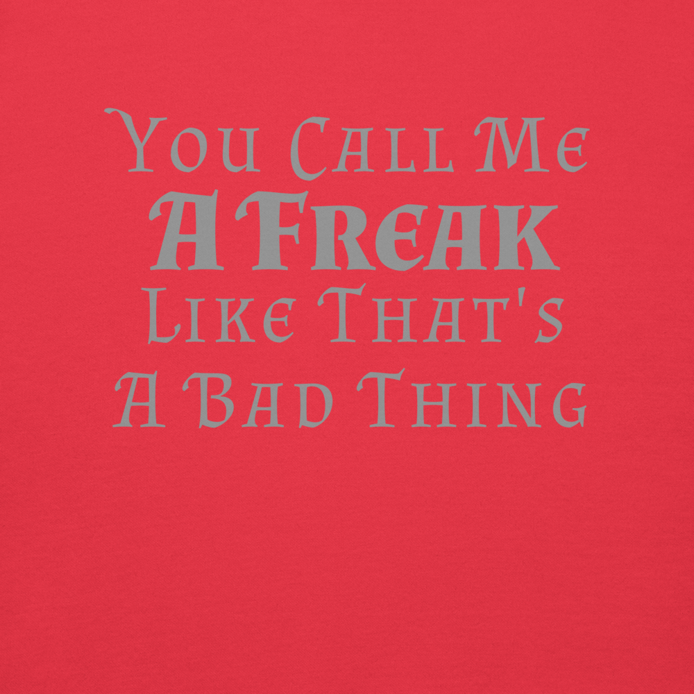 "You Call Me A Freak Like That's A Bad Thing" printed on a team red background