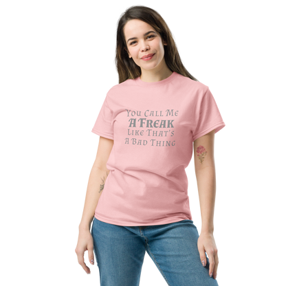 "You Call Me A Freak Like That's A Bad Thing" printed on a light pink unisex classic tee worn by a female