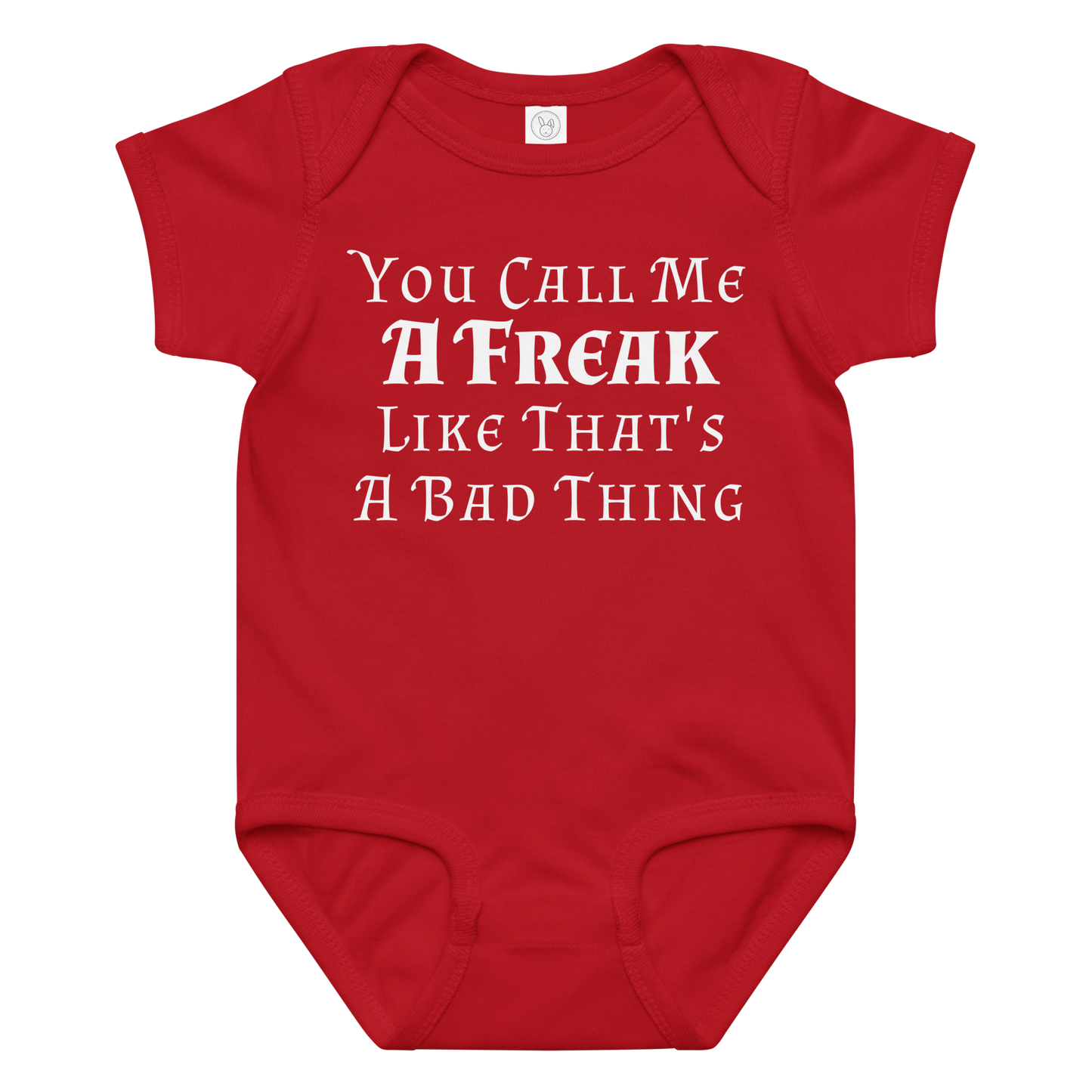 "You Call Me A Freak Like That's A Bad Thing" printed on a red baby jersey bodysuit laying on a flat surface amongst other clothes