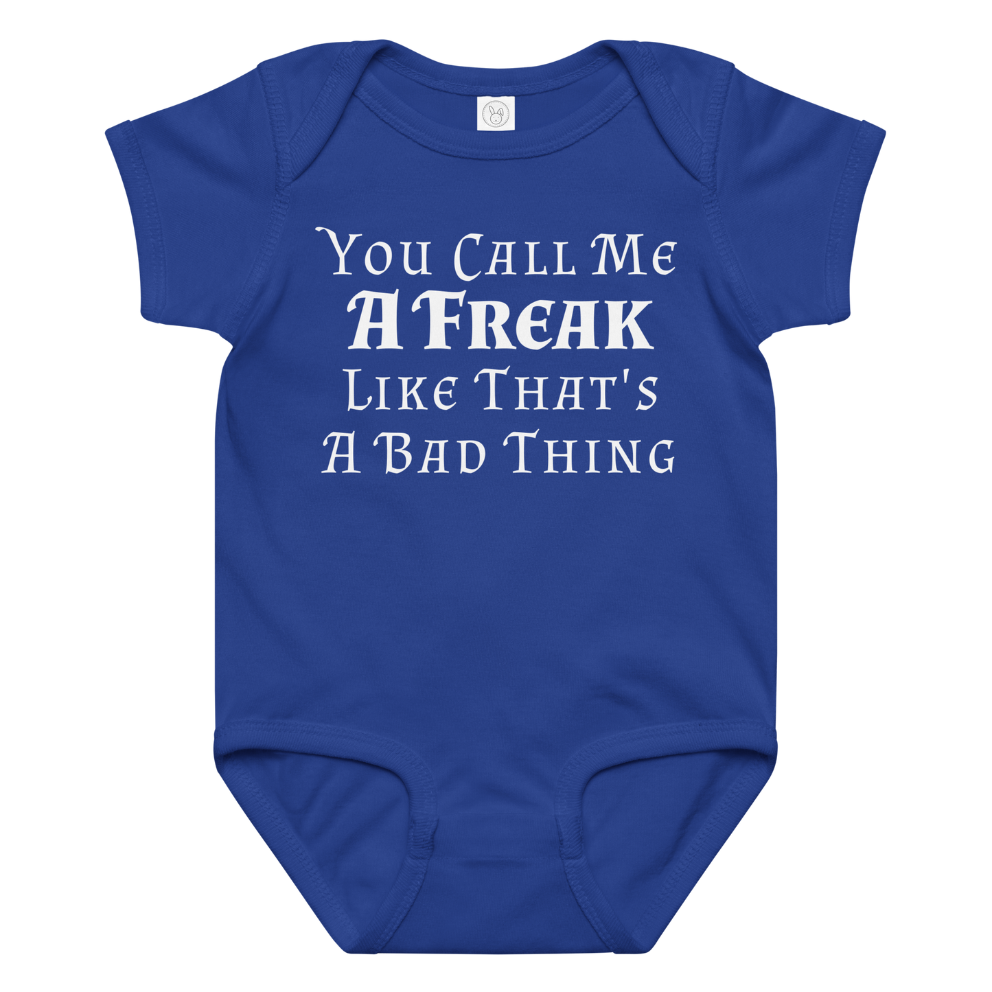 "You Call Me A Freak Like That's A Bad Thing" printed on a royal baby jersey bodysuit laying on a flat surface amongst other clothes