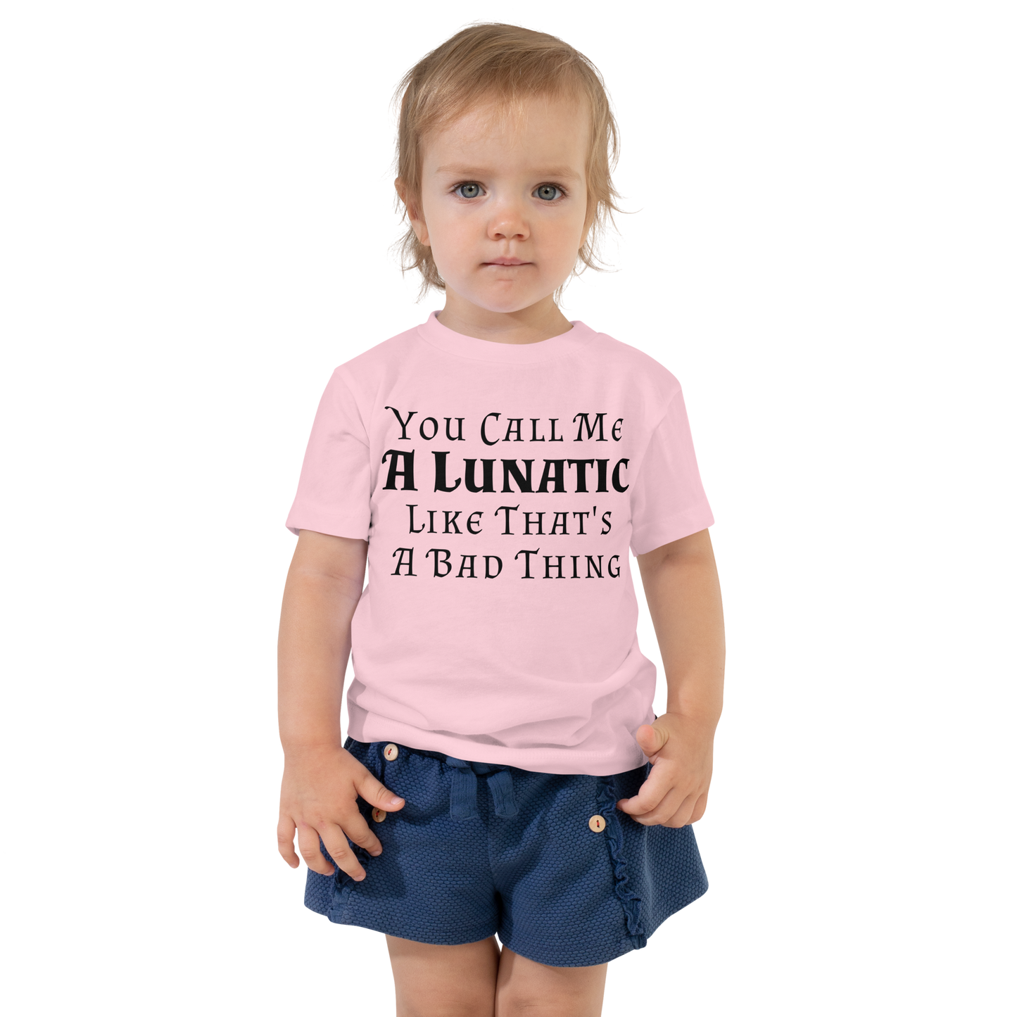 "You Call Me A Lunatic Like That's A Bad Thing" printed on a pink toddler short sleeve tee worn by a female