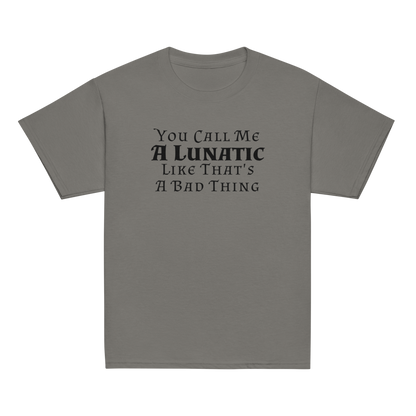 "You Call Me A Lunatic Like That's A Bad Thing" printed on a charcoal youth classic tee laying on a flat surface