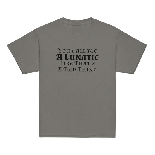 "You Call Me A Lunatic Like That's A Bad Thing" printed on a charcoal youth classic tee laying on a flat surface