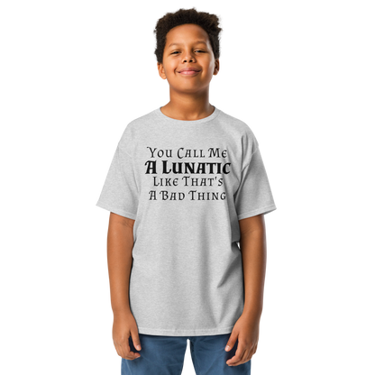 "You Call Me A Lunatic Like That's A Bad Thing" printed on a sport grey youth classic tee worn by a male