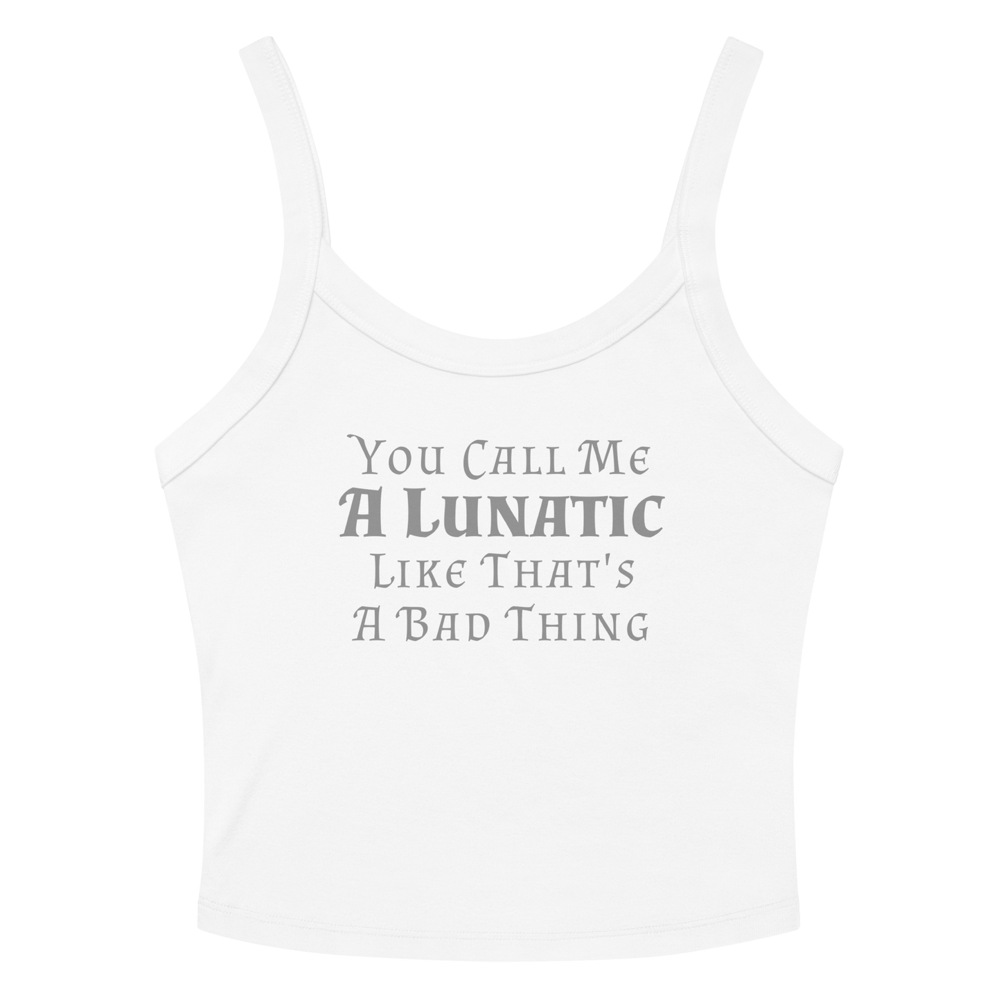 "You Call Me A Lunatic Like That's A Bad Thing" printed on a solid white blend women's micro-rib tanktop laying on a flat surface amongst sunglasses and shorts