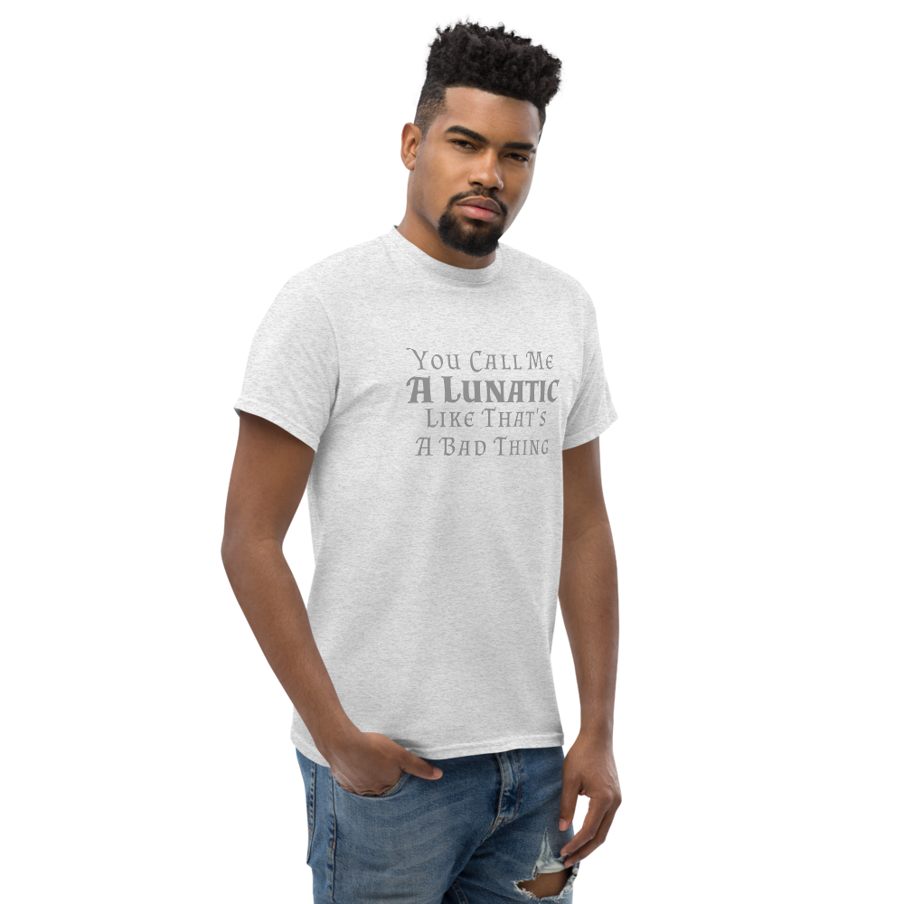 "You Call Me A Lunatic Like That's A Bad Thing" printed on a ash unisex classic tee worn by a male