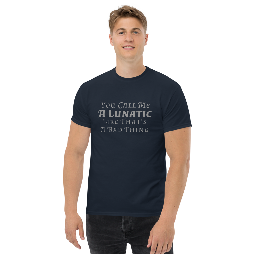 "You Call Me A Lunatic Like That's A Bad Thing" printed on a navy unisex classic tee worn by a male