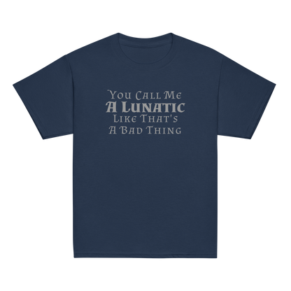 "You Call Me A Lunatic Like That's A Bad Thing" printed on a navy youth classic tee laying on a flat surface