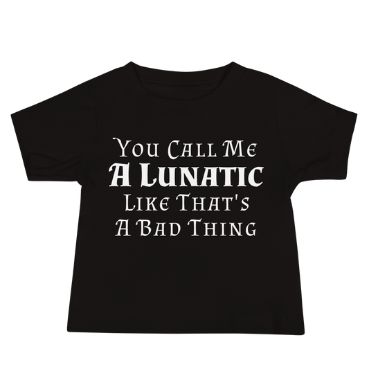 "You Call Me A Lunatic Like That's A Bad Thing" printed on a black baby jersey short sleeve tee laying on a flat surface