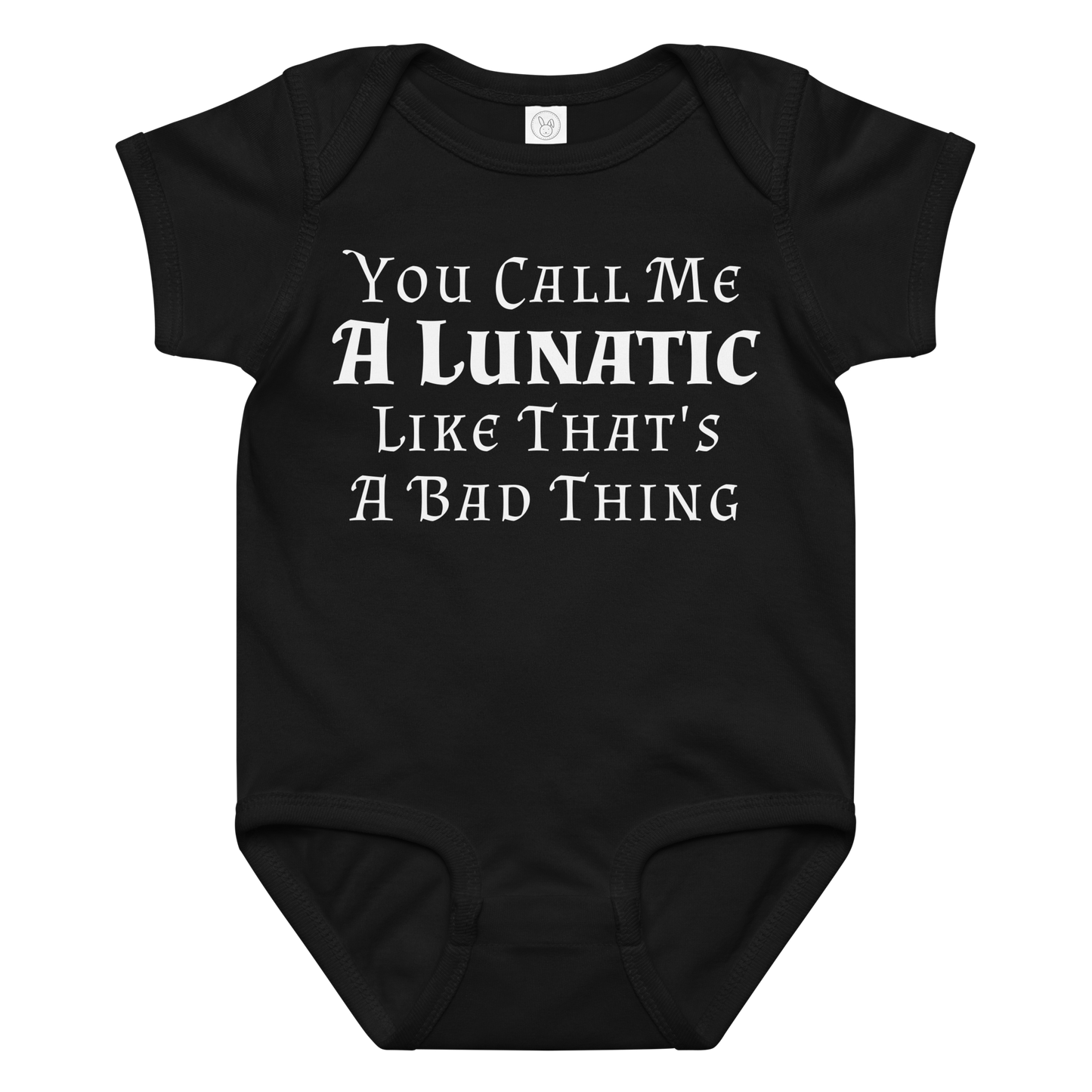 "You Call Me A Lunatic Like That's A Bad Thing" printed on a black baby jersey bodysuit laying on a flat surface amongst other clothes