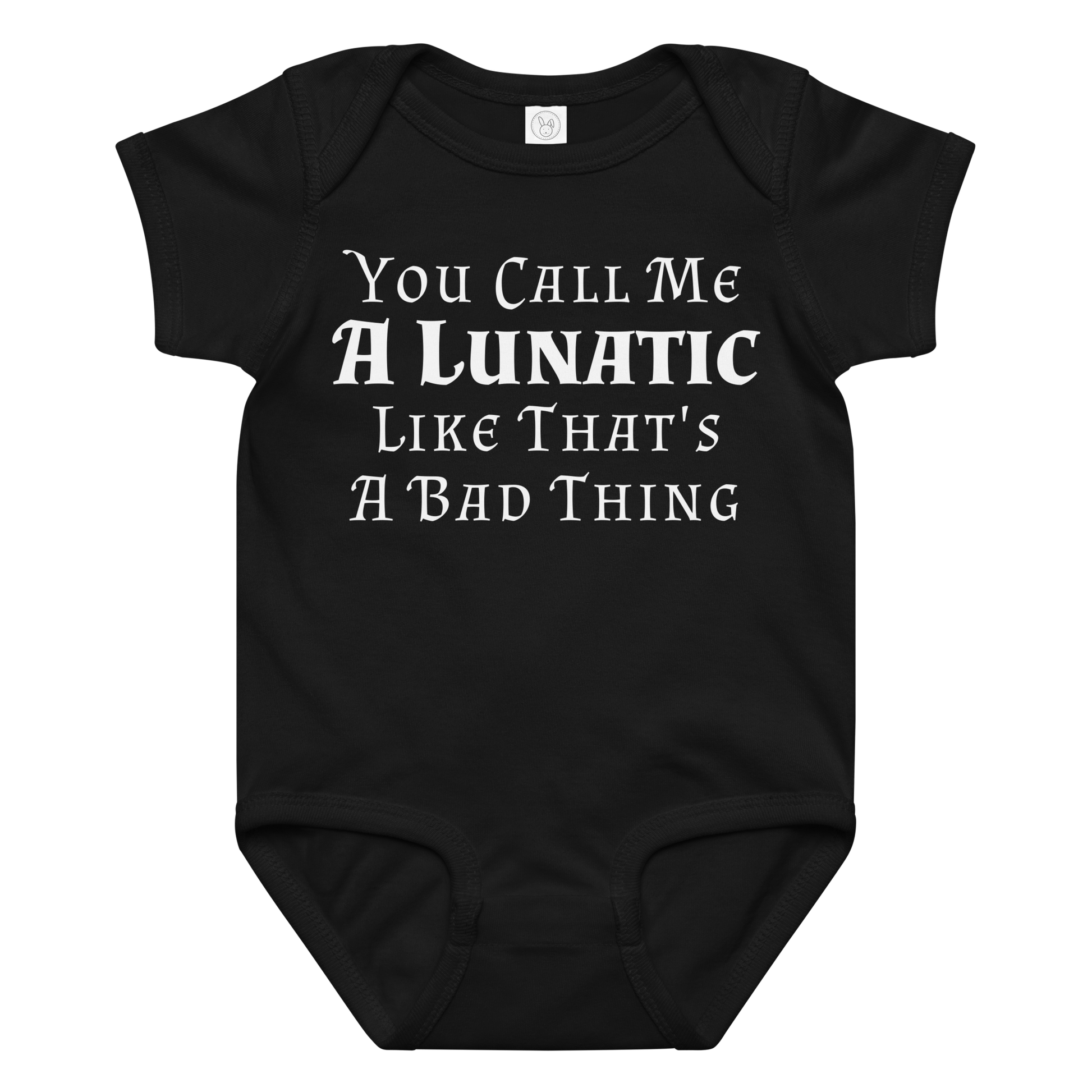 "You Call Me A Lunatic Like That's A Bad Thing" printed on a black baby jersey bodysuit laying on a flat surface amongst other clothes