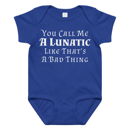 "You Call Me A Lunatic Like That's A Bad Thing" printed on a royal baby jersey bodysuit laying on a flat surface amongst other clothes