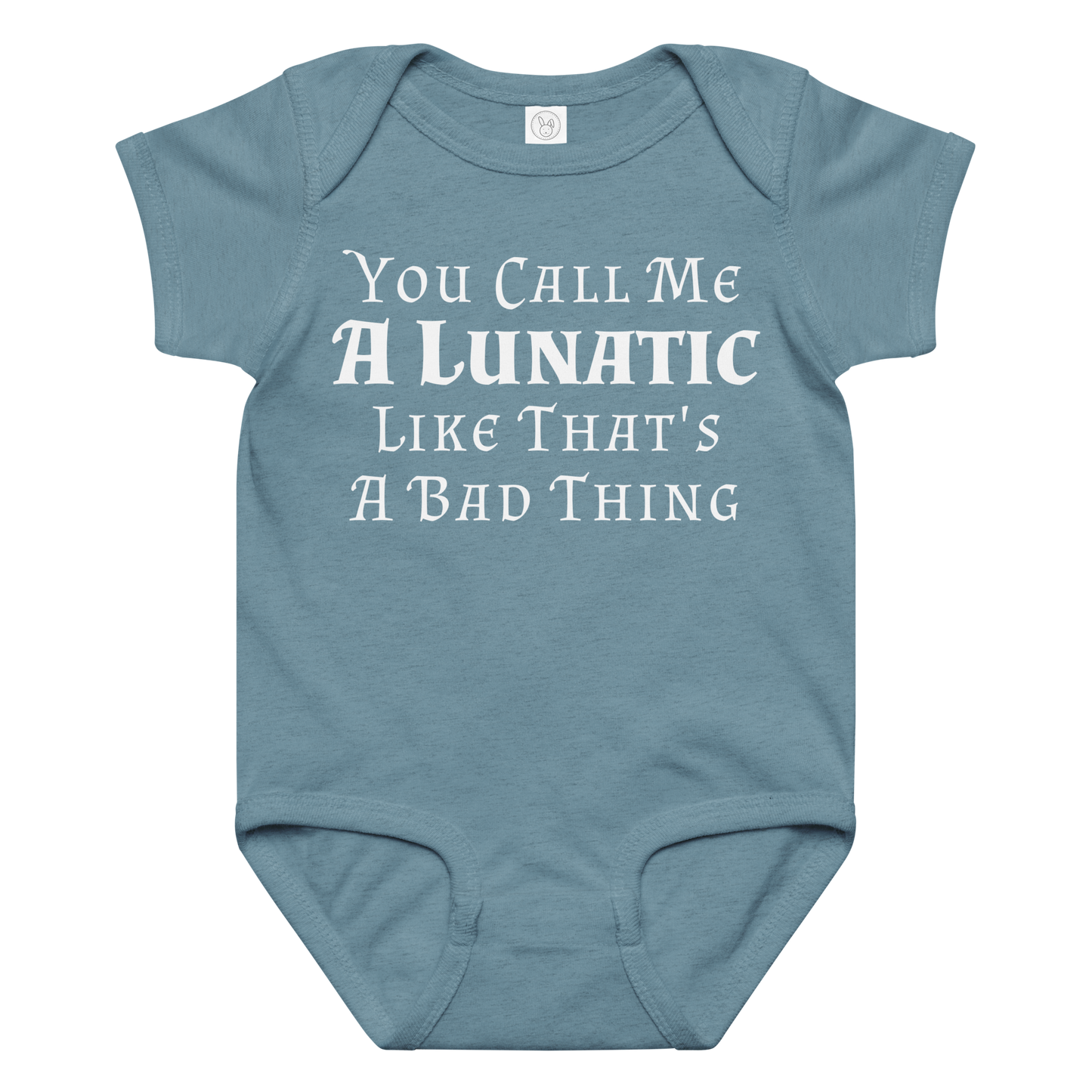 "You Call Me A Lunatic Like That's A Bad Thing" printed on a vintage indigo baby jersey bodysuit laying on a flat surface amongst other clothes