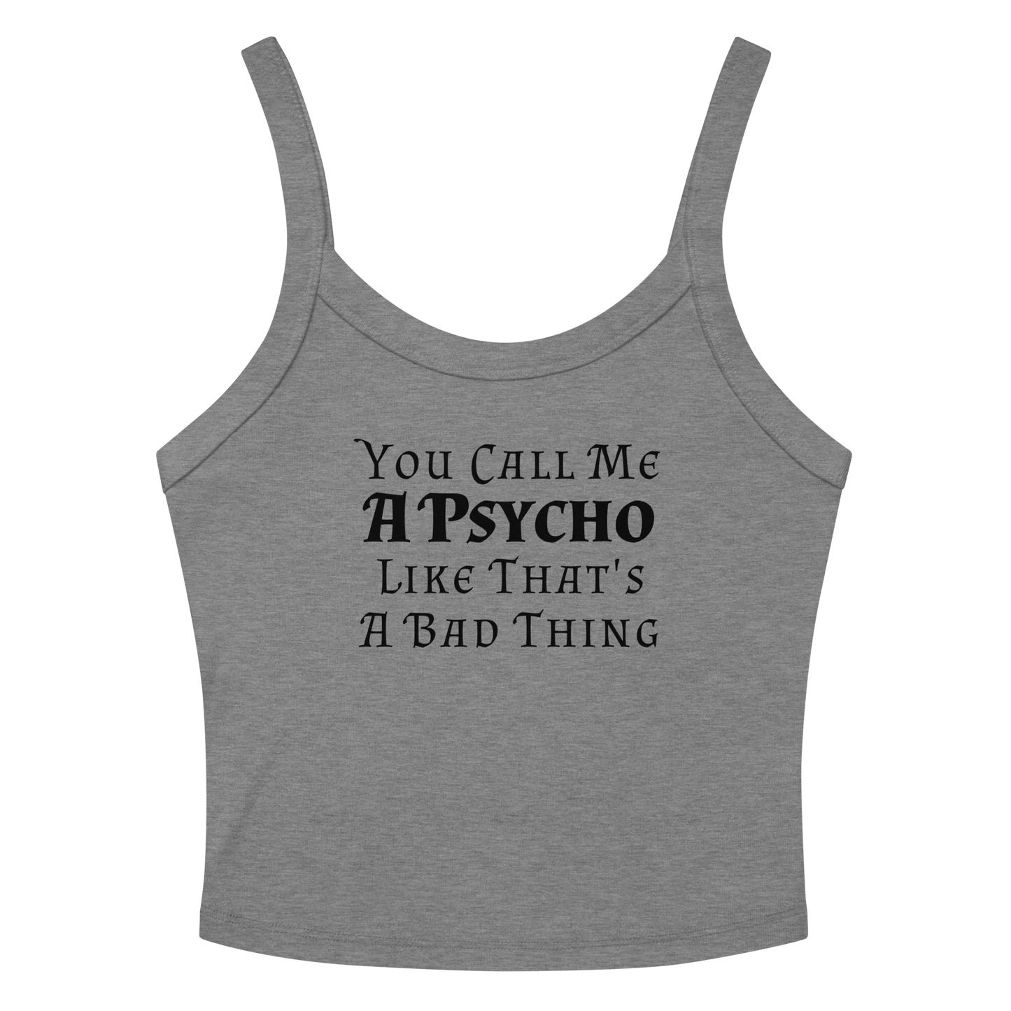 "You Call Me A Psycho Like That's A Bad Thing" printed on a athletic heather women's micro-rib tanktop laying on a flat surface amongst sunglasses and shorts