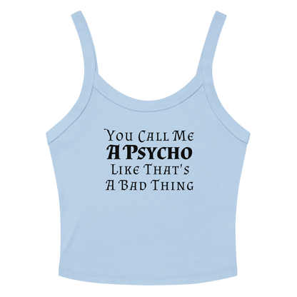 "You Call Me A Psycho Like That's A Bad Thing" printed on a solid baby blue blend women's micro-rib tanktop laying on a flat surface amongst sunglasses and shorts